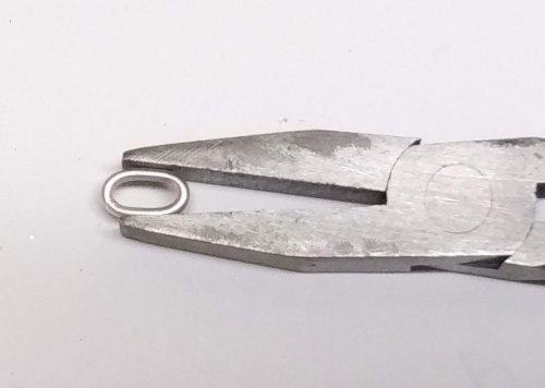 Judy Larson's Making Chain with Wubbers and Wire - , Contemporary Wire Jewelry, Making Chain, Chain Making , Butane Torch, Soldering, Solder, Repeat this process until an oval shape is achieved.